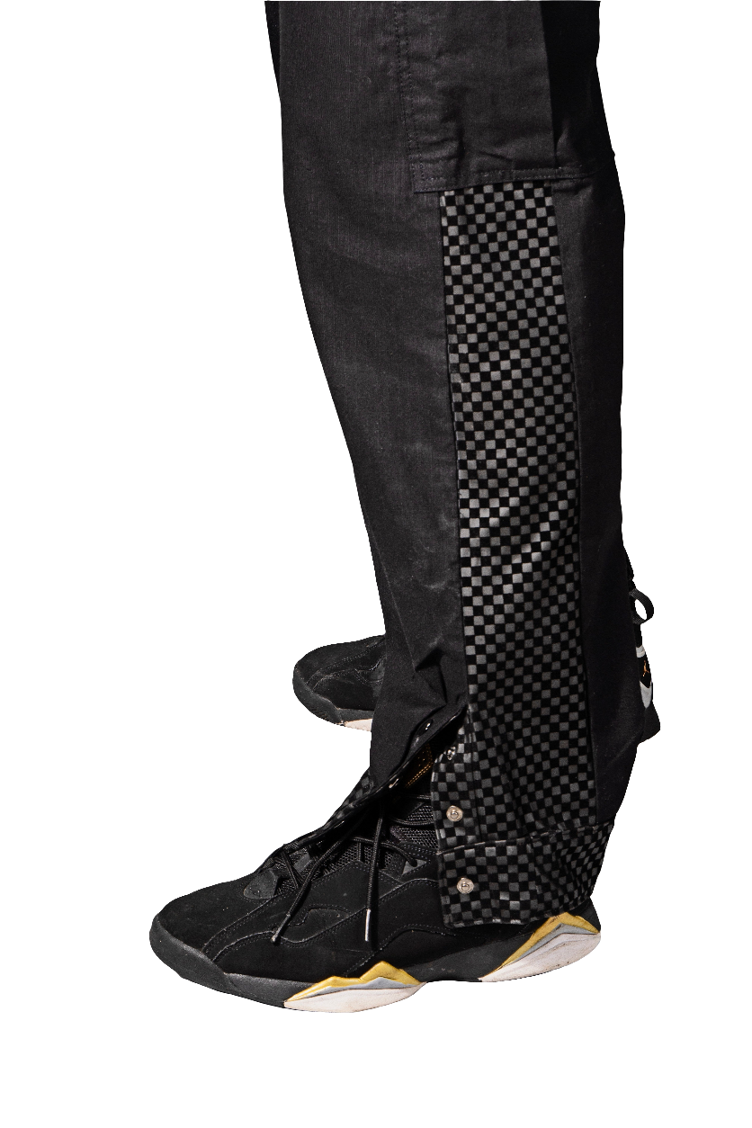 Checkerboard panel detail along the outer leg